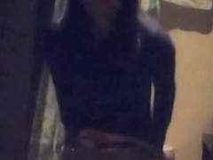 Brunette amateur calmly sitting on toilet waiting to piss