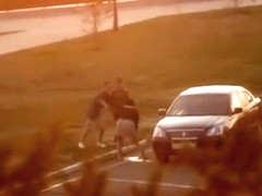 Unaware cutie pisses on the parking lot