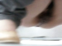 Asian chick pissing in a squatting toilet while being spy cammed