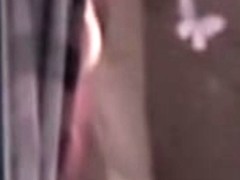 Neighbor is undressing on the window voyeur video