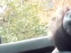 Man sitting in the car giving the view on his hard cock