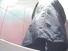 Girl on toilet voyeur scenes takes off pants and pisses