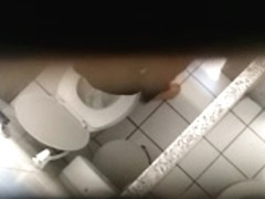 Chick is pissing, while a cam is filming