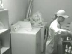 Lesbian cuties caught having sex on a laundry room spy cam
