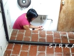 Black haired chubby girl taking a piss and blowing her nose