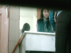 Hidden pissing cam of hairy Asian Pussy squatting on toilet