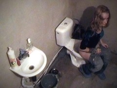 Voyeur brunette pissing