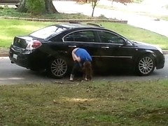 Girl caught on voyeur cam pissing on the car wheel