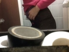 The ass of amateur spied while her pissing on toilet