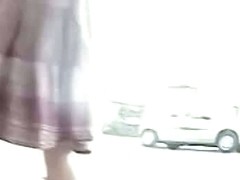 Perfectly round ass in tight jeans skirt