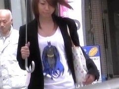 Asian babe in a short skirt gets a street sharking.