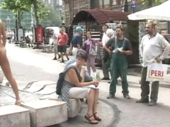 Girl strips nude in public all over town