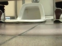 Girls on hunkers pissing on toilet and showing hairy nubs