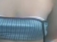 Sweetie putting on her lingerie in change cabin