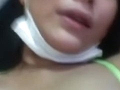 Asian babe masturbates with a dildo