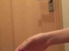 Asian pisses into toilet