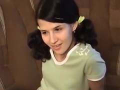 Brunette girl gets slutty on sofa